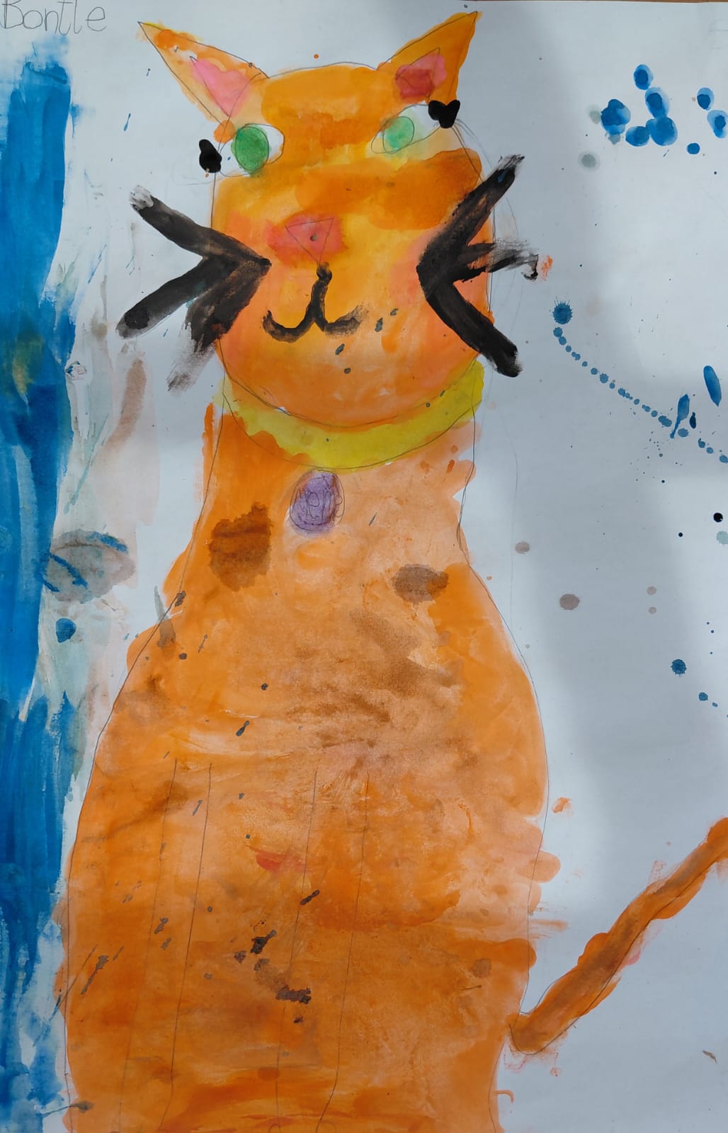 A Grade 1 learner's painting of a ginger cat with a yellow collar and long black whiskers